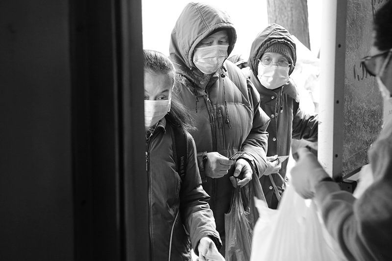 2020 : Food Lines : Seventh Day Adventists Help the Needy : Streetlife : New York City : Times Square : Richard Moore : Photographer : Photojournalist